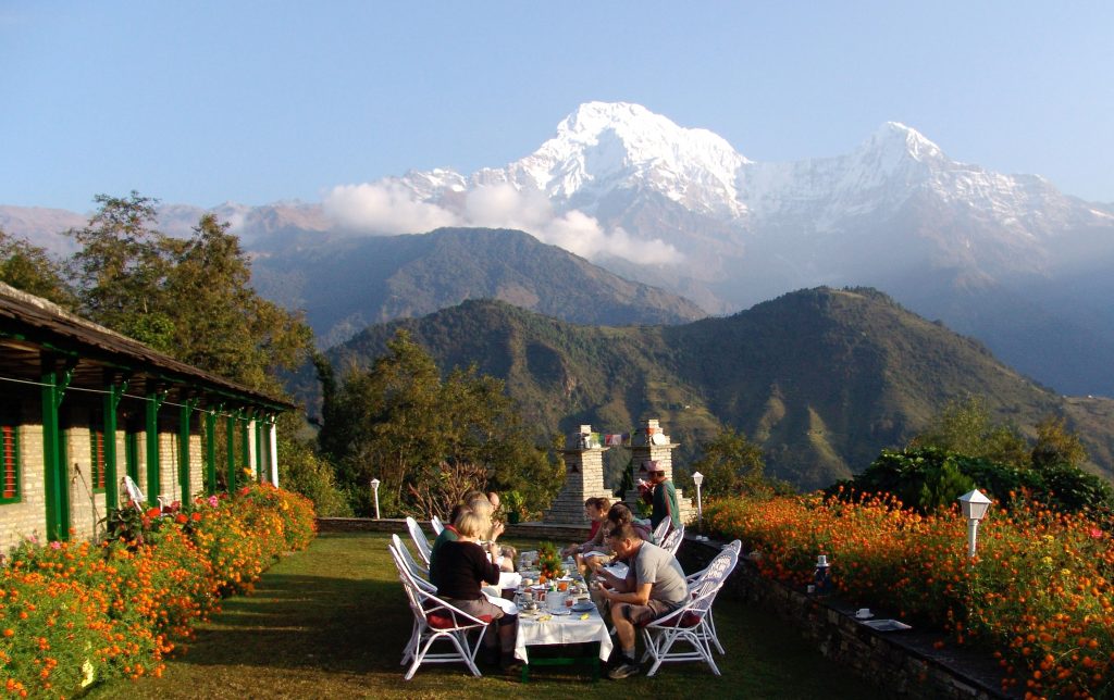 Guests enjoying breakfast at a Ker and Downey, a high-end tourist property, in Ghandruk. Photo: Ker and Downey. foreign tourists domestic tourists