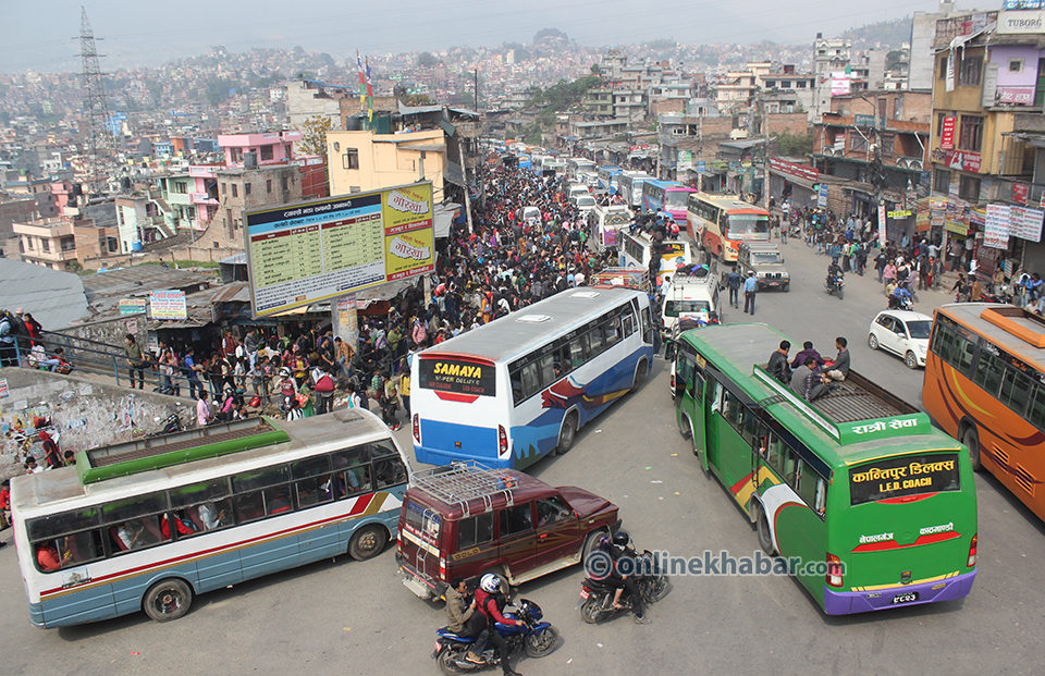 Hundreds of people leave Kathmandu everyday on a public transport. 