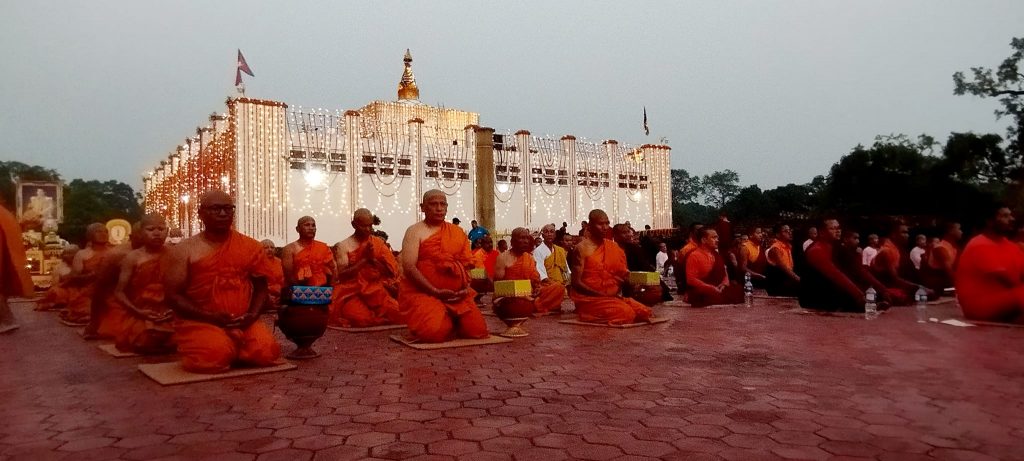 Monks praying at Lumbini on Buddha Jayanti