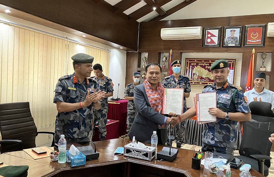 Armed Police Force (APF) and Nepal Electricity Authority (NEA) sign an agreement to use electric stoves at APF barracks and instal charging stations, in Kathmandu, on Friday, August 26, 2022. 