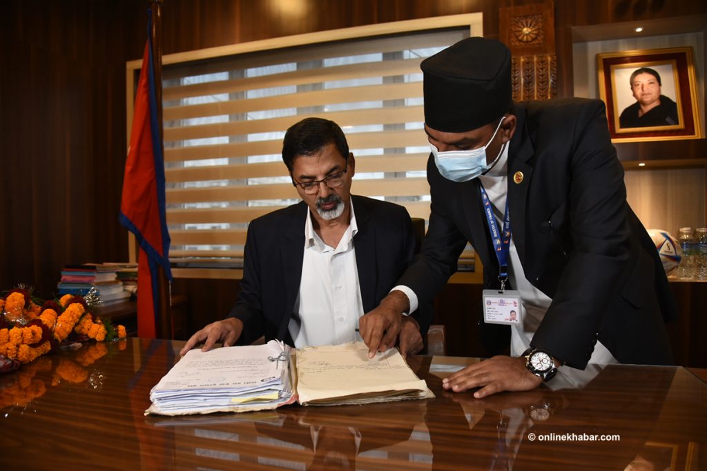 Finance Minister Janardan Sharma assumes office after his reappointment, on Sunday, July 31, 2022.