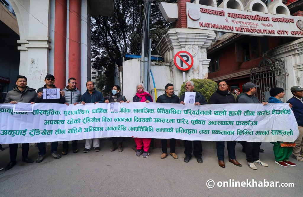 Occupy Tundikhel activists gherao the Kathmandu metropolitan city office against the Khulamanch underground parking facility plan, on Monday, January 2, 2023. Photo: Aryan Dhimal