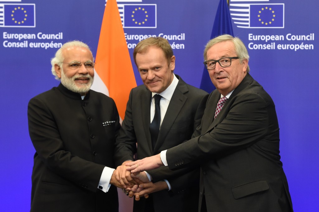 Handshake between Narendra Modi, Donald Tusk and Jean-Claude Juncker (from left to right)