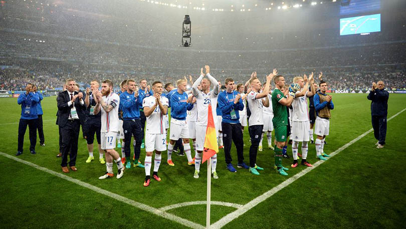 Iceland's midfielder Aron Gunnarsson and team mates acknowledge the supporters after the Euro 2016 quarter-final football match between France and Iceland at the Stade de France in Saint-Denis, near Paris, on July 3, 2016. France won the match 5-2. / AFP / MARTIN BUREAU (Photo credit should read MARTIN BUREAU/AFP/Getty Images)