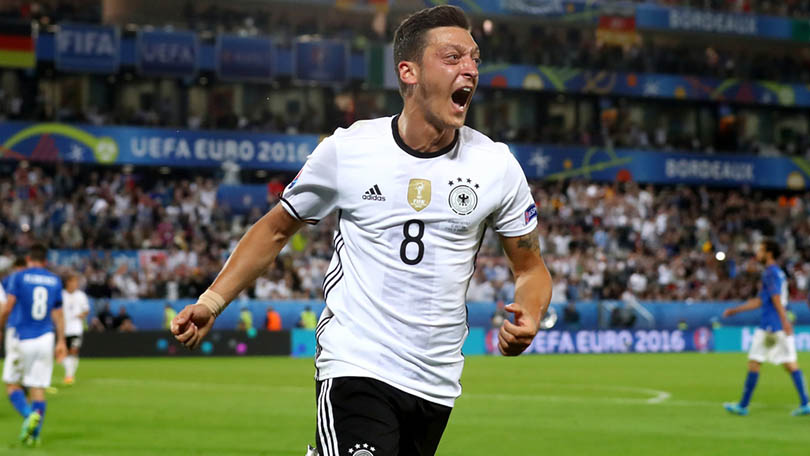 BORDEAUX, FRANCE - JULY 02: Mesut Oezil of Germany celebrates scoring the opening goal during the UEFA EURO 2016 quarter final match between Germany and Italy at Stade Matmut Atlantique on July 2, 2016 in Bordeaux, France. (Photo by Alexander Hassenstein/Getty Images)