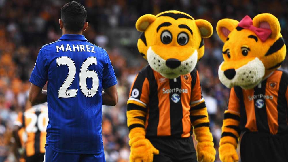 Hull City 2-1 Leicester CityTwo Hull City mascots look at Riyad Mahrez of Leicester City prior to kick-off