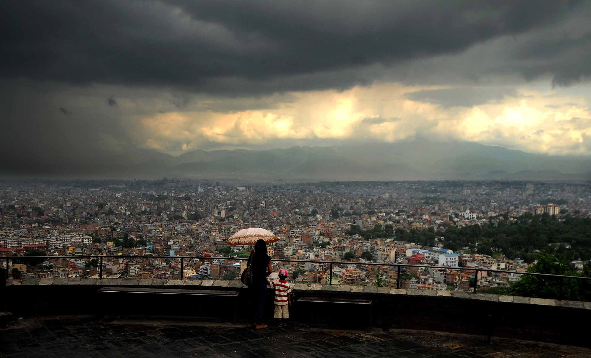Woman with her child enjoying to watching kathmandu valley view from Swyambhu in Kathmandu on Friday, June 21, 2013. Photo: Dipesh Shrestha/Nagarik/Republica