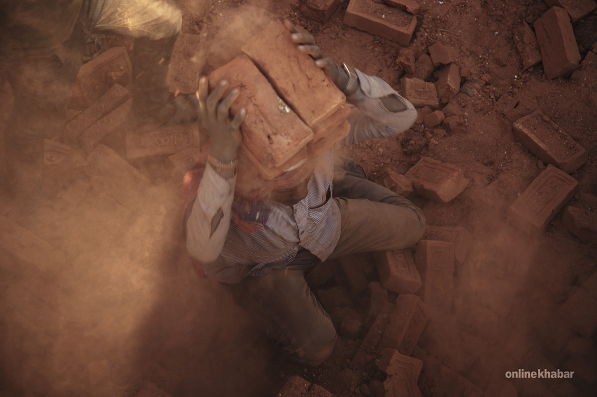 File: A brick kiln worker in Kathmandu