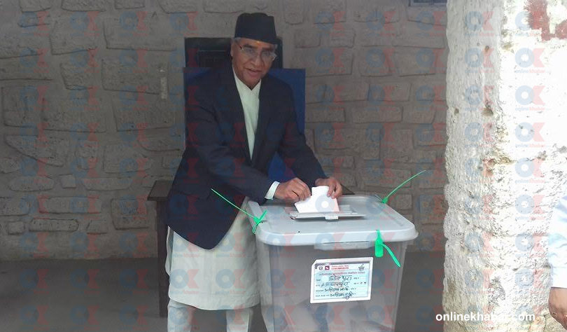 File: Prime Minister Sher Bahadur Deuba casts his vote in his village in the Dadeldhura district during local elections on Wednesday, June 29, 2017.