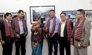 Speaker Gharti inaugurates exhibition by taking photo of journalists