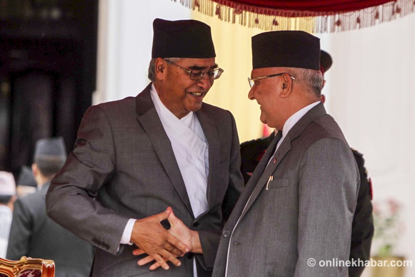 File: Sher Bahadur Deuba and KP Sharma Oli