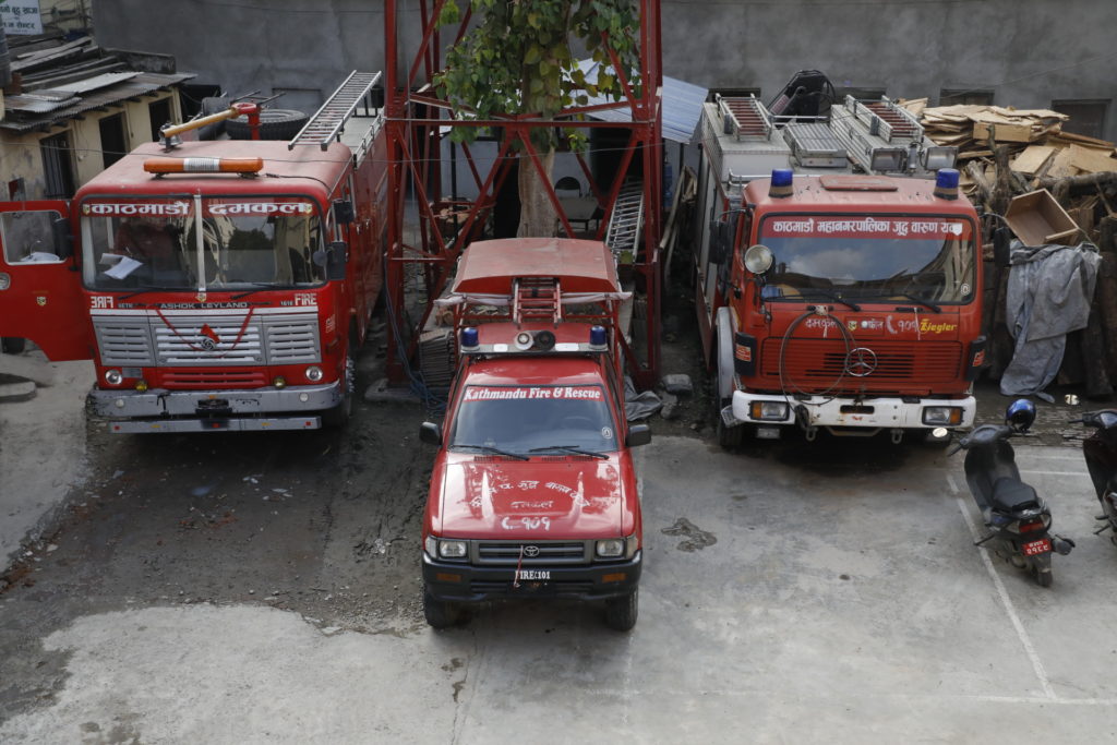 File: Fire engines and firefighters in Kathmandu