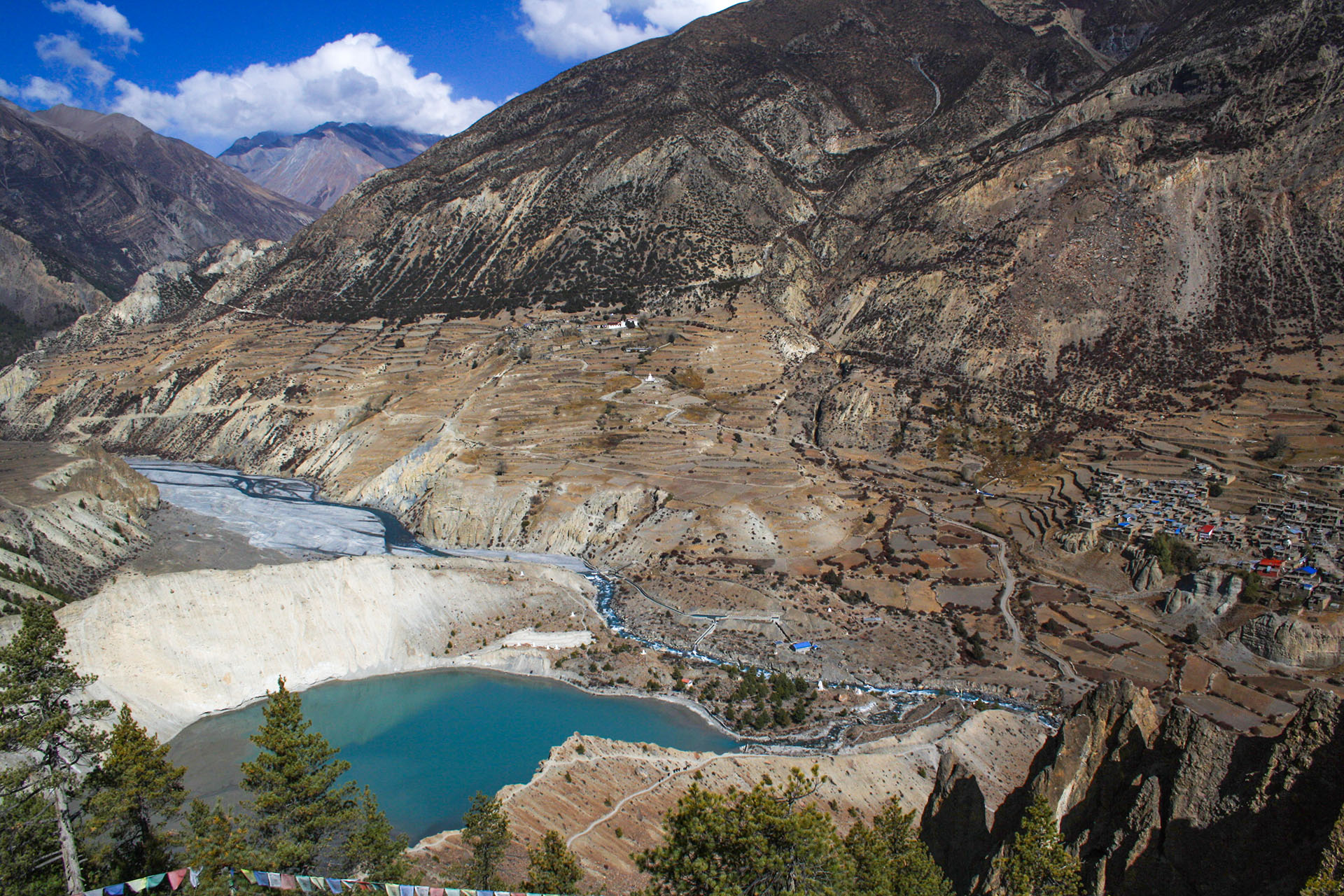 Gangapurna Lake and Manang seen from a hill opposite Manang, Nepal.