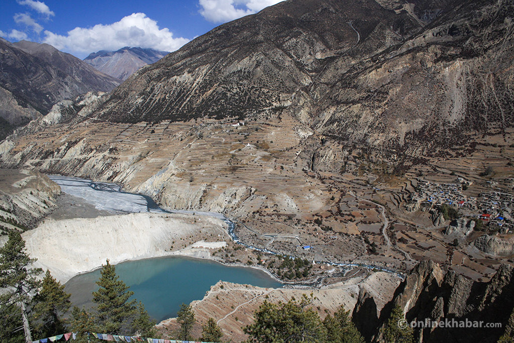 Gangapurna Lake and Manang seen from a hill opposite Manang, Nepal.