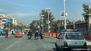 Kathmandu city, electricity authority at odds over removing ads from roadside poles