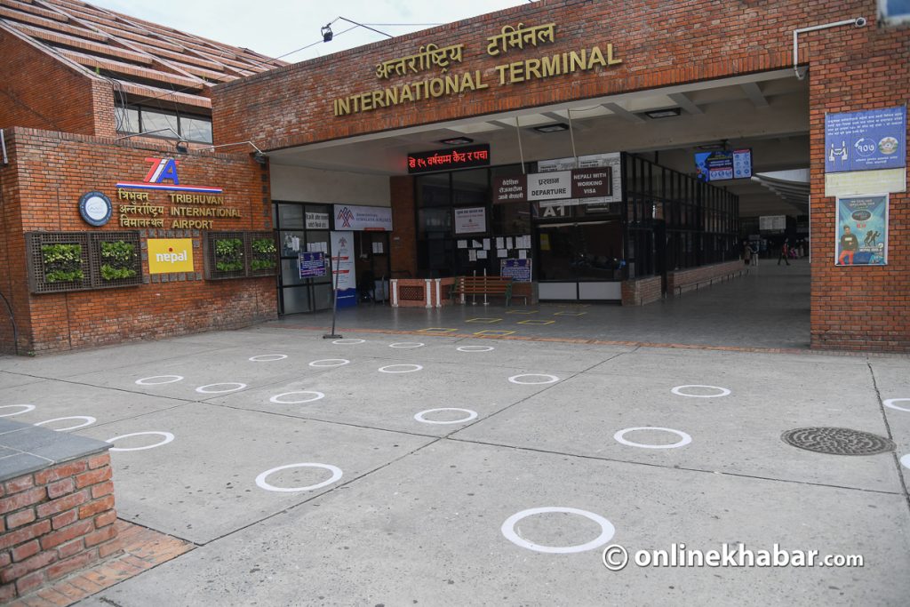 File: The international terminal of Tribhuvan International Airport with distance marks for Covid-19 prevention