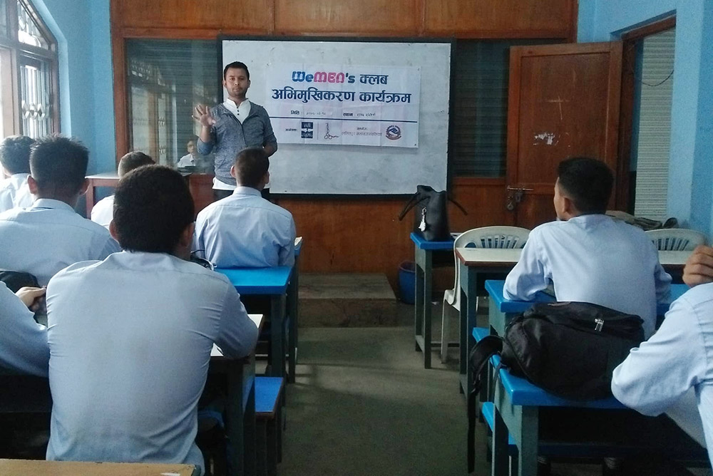Volunteers of Nepali Brothers holding an orientation session on the role of men in the campaign against violence against women, at Grand Academy, on June 28, 2019. Photo courtesy: Nepali Brothers/Facebook