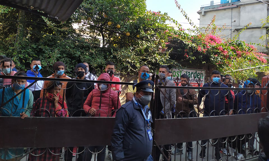 File: Foreign job aspirants waiting for their turn to be interviewed by a recruitment agency in Kathmandu.