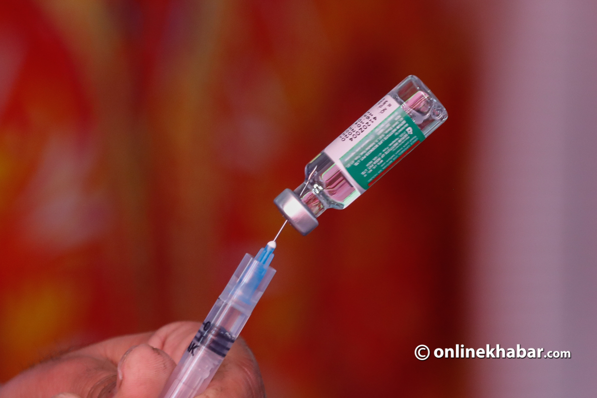 A health worker prepares a dose of a Covid-19 vaccine, in Kathmandu, January 2021.