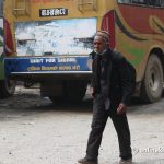 As Kathmandu lockdown begins, dozens such as this septuagenarian walk kilometres to go home