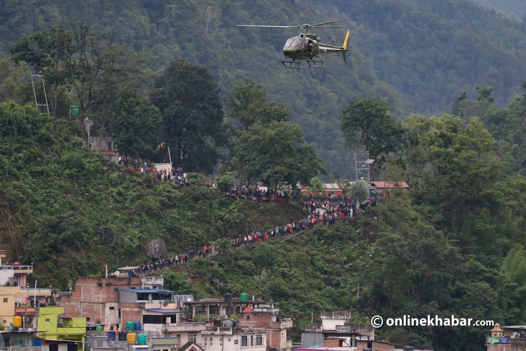 A Nepal Army helicopter comes to rescue locals from a flood in Melamchi of Sindhupalchok on Wednesday, June 16, 2021. Photo: Bikas Shrestha