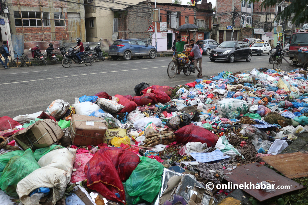 File: Waste piles up on a roadside in Kathmandu in August 2021. Photo: Aryan Dhimal