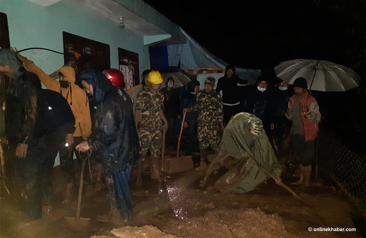 Security personnel and locals clearing a landslide site in Gulmi, on Wednesday, September 22, 2021.