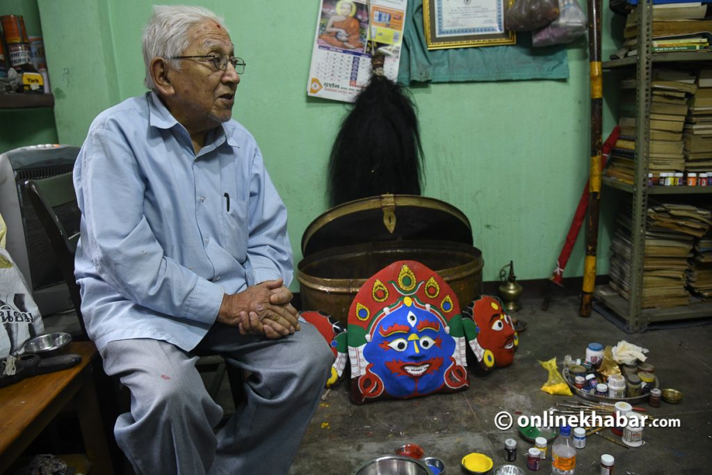 Tej Bahadur Chitrakar working on Chandi Kumari's mask for upcoming Aakash Bhairav naach