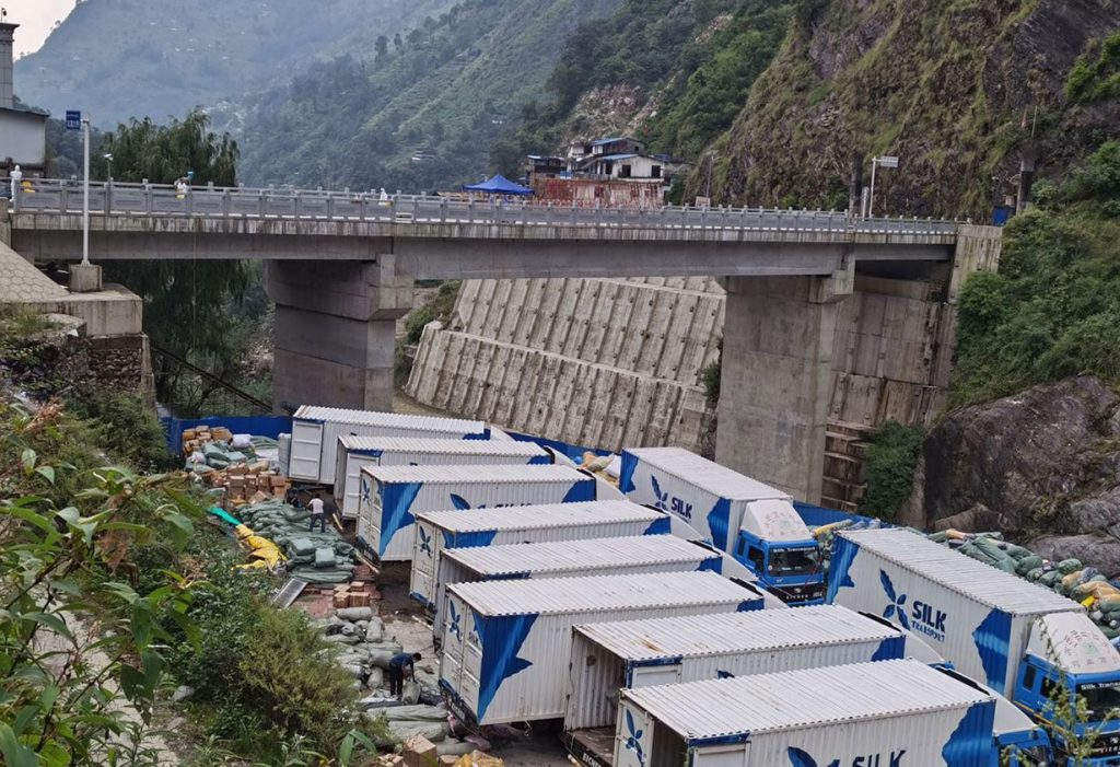 Trucks of Silk Road Transport stuck at Tatopani border point.