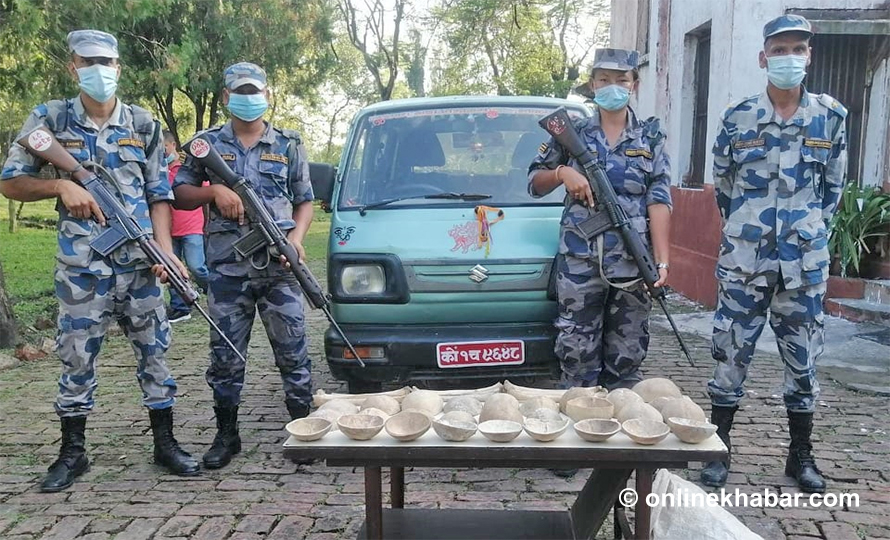 Police making the confiscated bones and the impounded vehicle in Biratnagar.