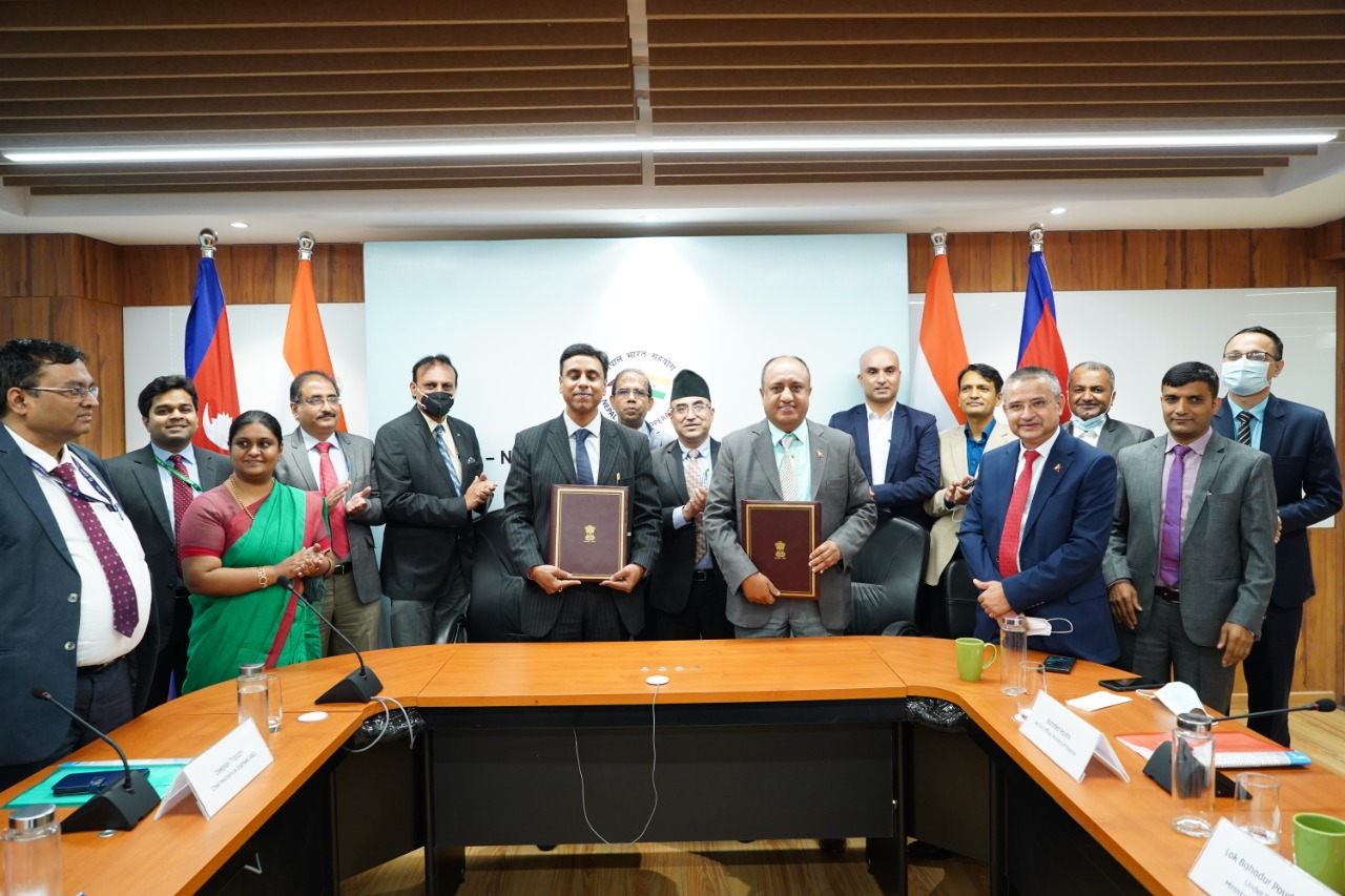 Officials of Nepal and India sign the standard operating procedure for cross-border Janakpur-Jainagar railway operation, in New Delhi, in October 2021. Photo: Indian Embassy in Kathmandu