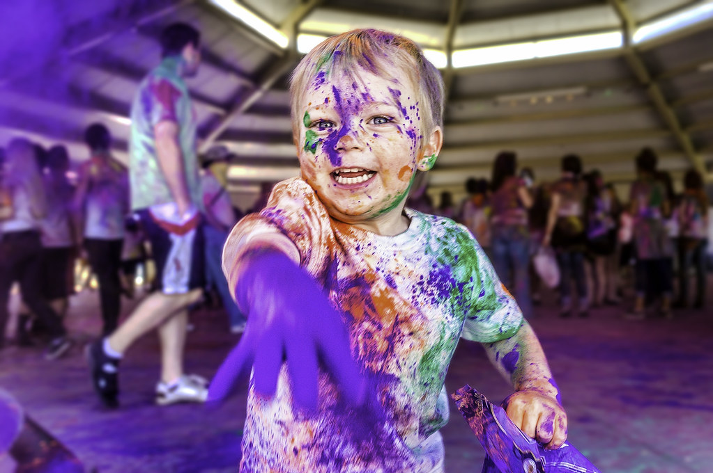 A child celebrating Holi, the festival of colours. Photo: Flickr
