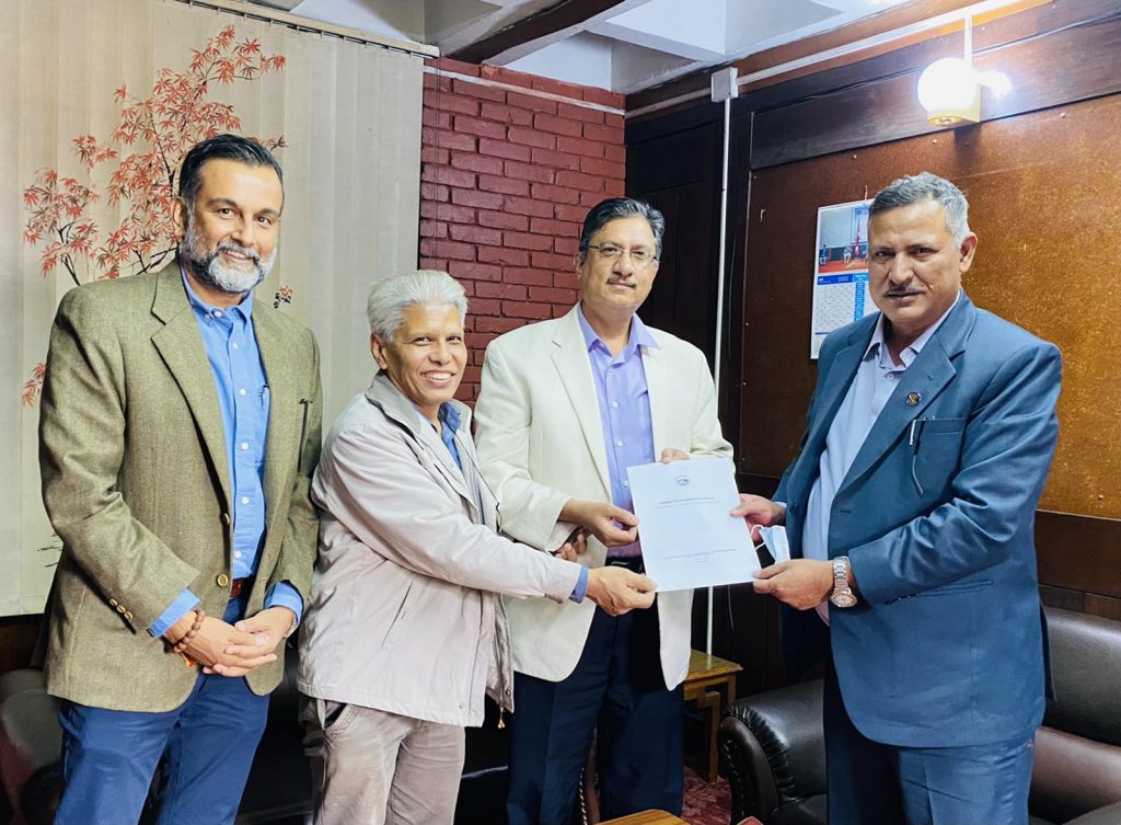 A delegation of the Nepal Health Foundation submits a policy brief on the elimination of trans fat to Health Minister Birodh Khatiwada, in Kathmandu, on Monday, November 1, 2021. Photo: Courtesy: Amod Pyakuryal