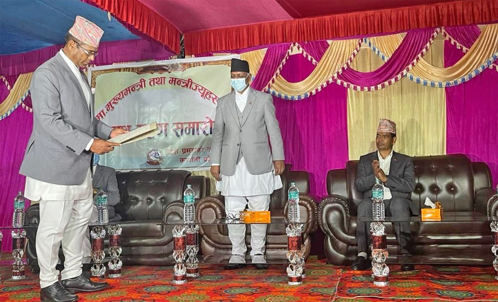 Karnali's new chief minister Jeevan Bahadur Shahi takes the oath of office and secrecy from Governor Govinda Prasad Kalauni, in Surkhet, on Tuesday, November 2, 2021.