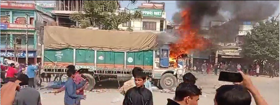 Locals in Lamkichuha of Kailali torch a truck after it hit and killed a woman, on Thursday, November 25, 2021.