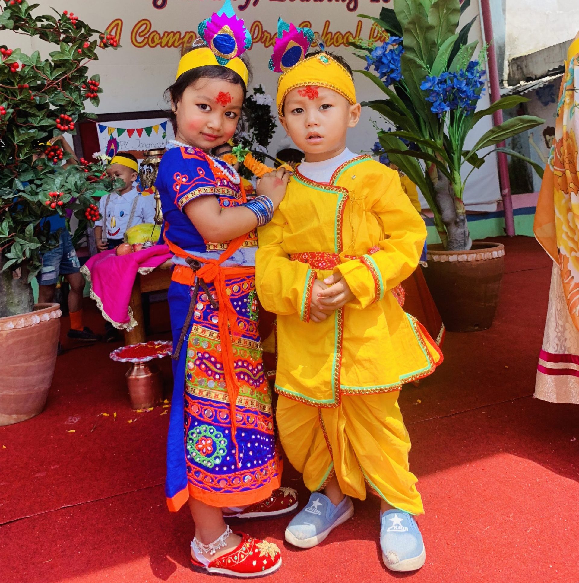 Children dressed in Radha-Krishna attires during a school festival celebration. Photo: Kumud Bhatta