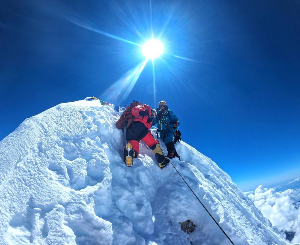 Malla on the top of the true summit of Manaslu. 
