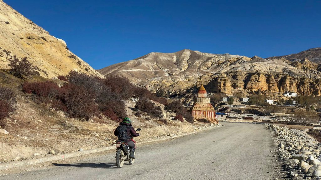 A motorbiker on the way to Mustang, one of the best motorbiking destinations in Nepal. Photo: Lelish Maharjan