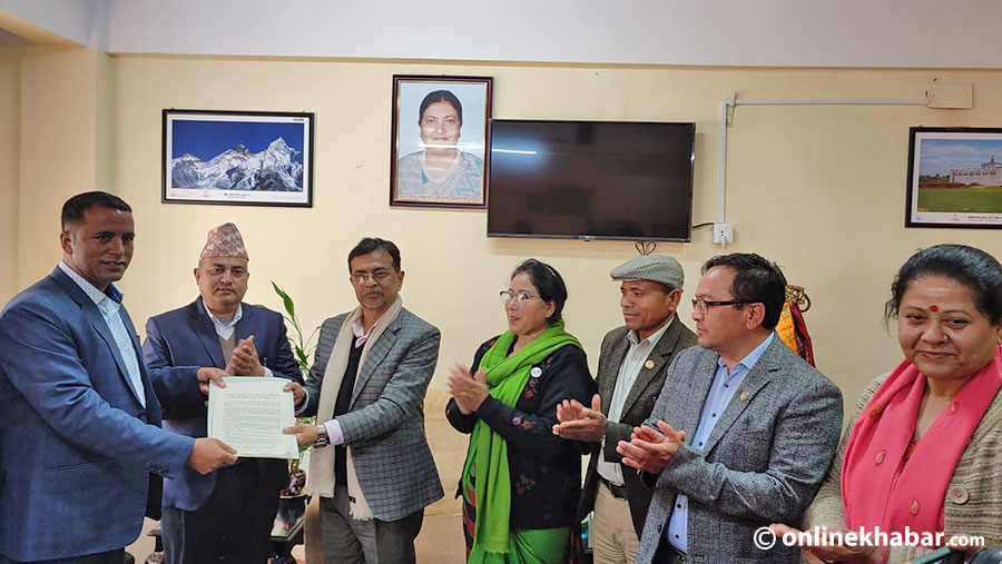 Members of the ruling coalition task force submit the common minimum programme to Bagmati Chief Minister Rajendra Pandey, on Thursday, December 2, 2021.