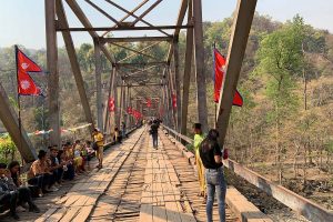 Man falls off Kailali bridge, dies