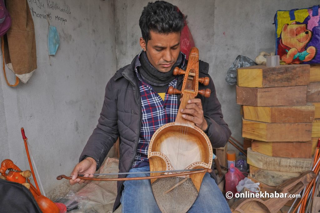 Gopal Gayak plays his sarangi.