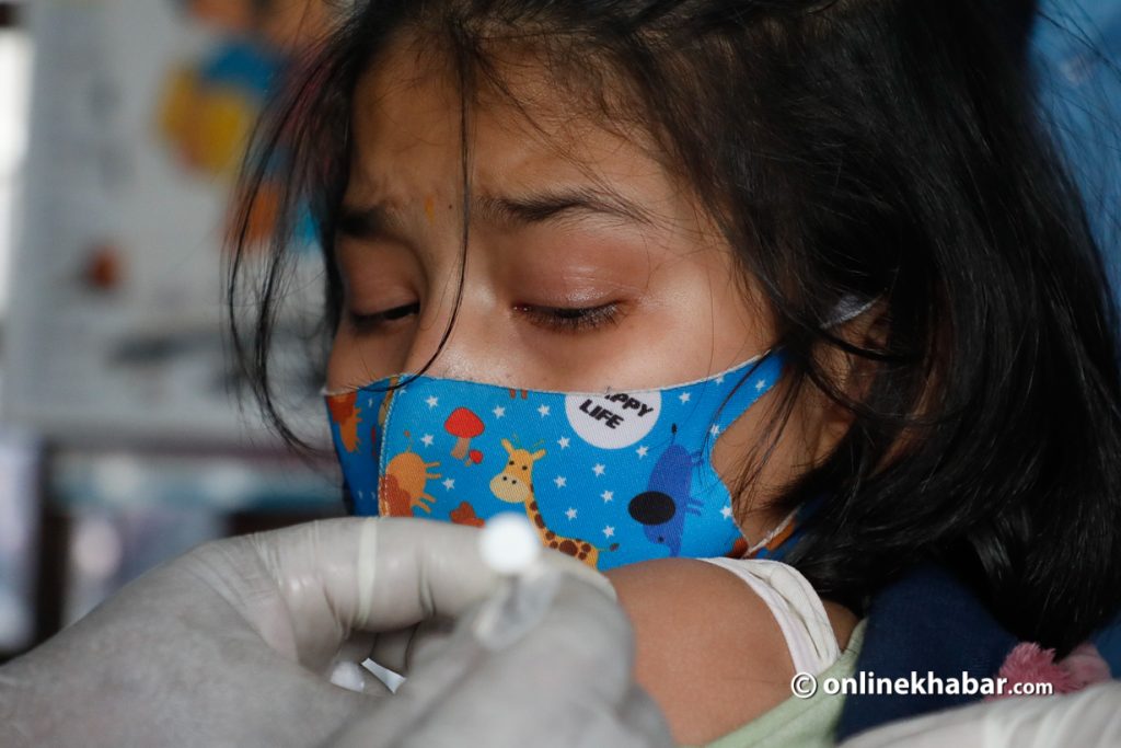 A girl from Bhaktapur getting vaccinated on Sunday.