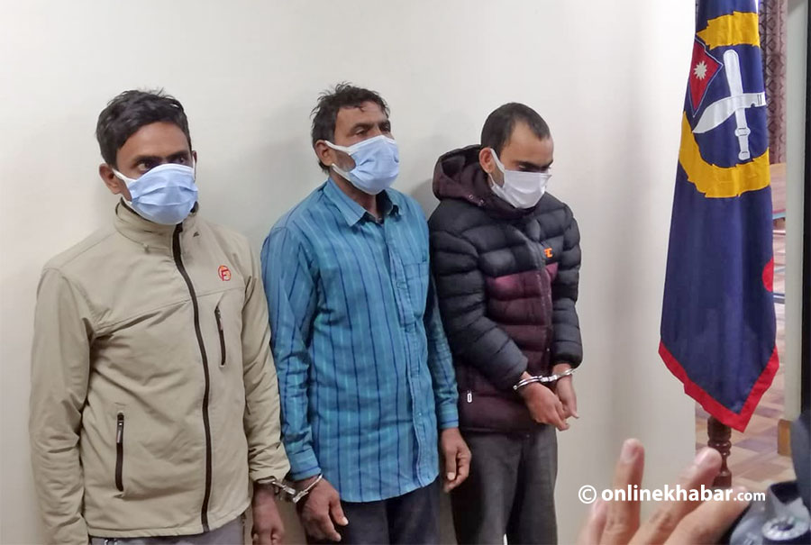 Three persons arrested on the charge of murdering three people in the Lalitpur and Morang districts in December 2021 are paraded on February 4, 2022.