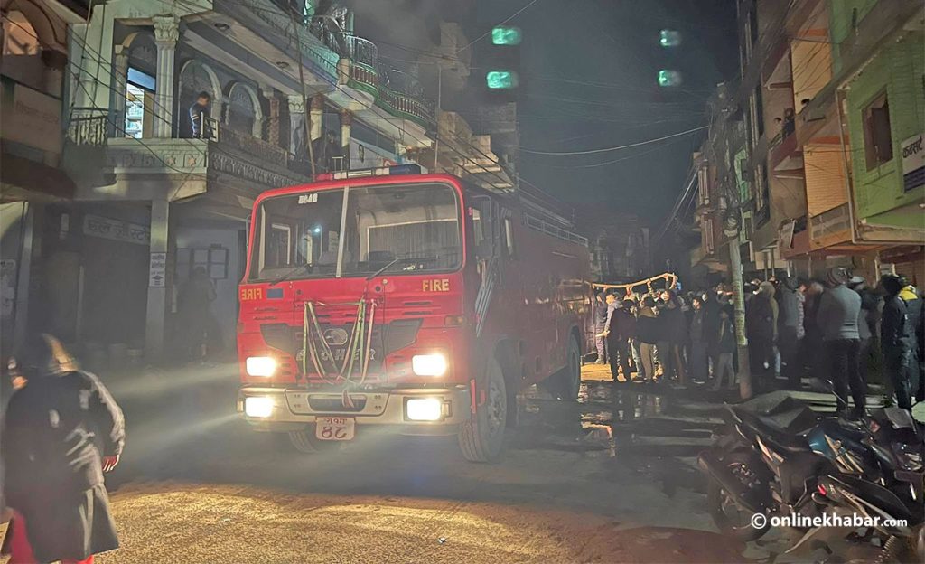 A fire engine prepares to douse the fire in Tulsipur, Dang, on Friday, February 11, 2022.