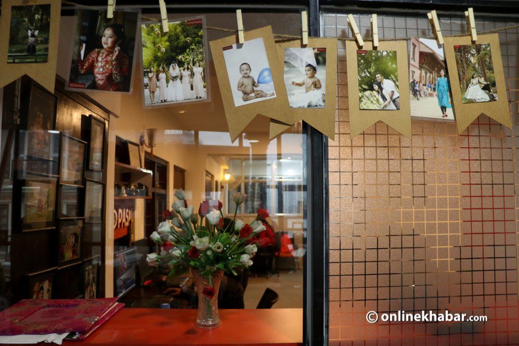 Photos hung in Fotopasal's office.  Photo: Aryan Dhimal