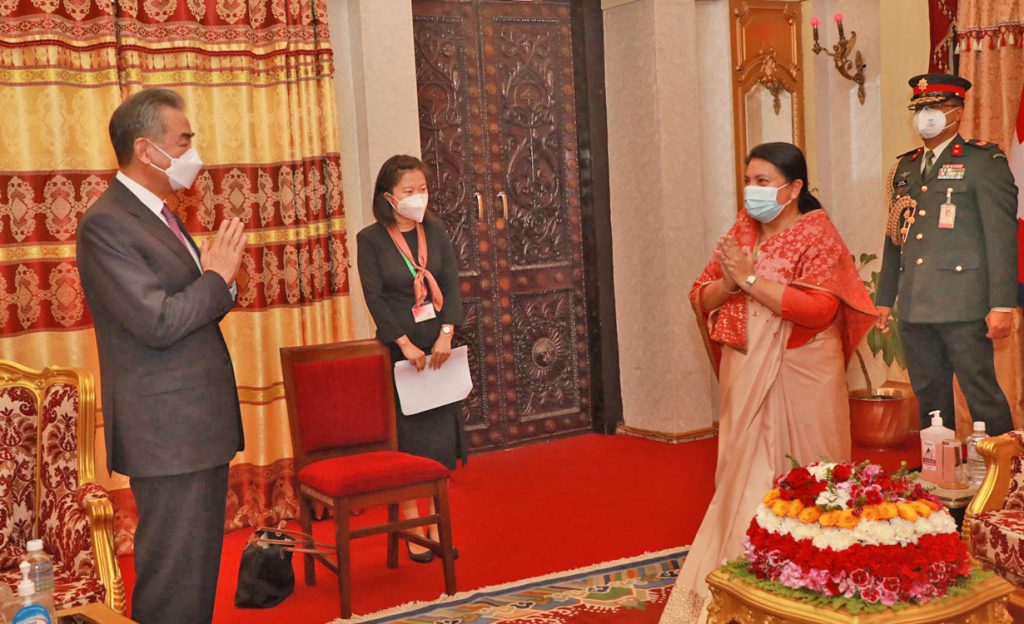 President Bidya Devi Bhandari welcomes Chinese Foreign Affairs Minister Wang Yi at her office, in Kathmandu, on Sunday, March 27, 2022. Photo: RSS
