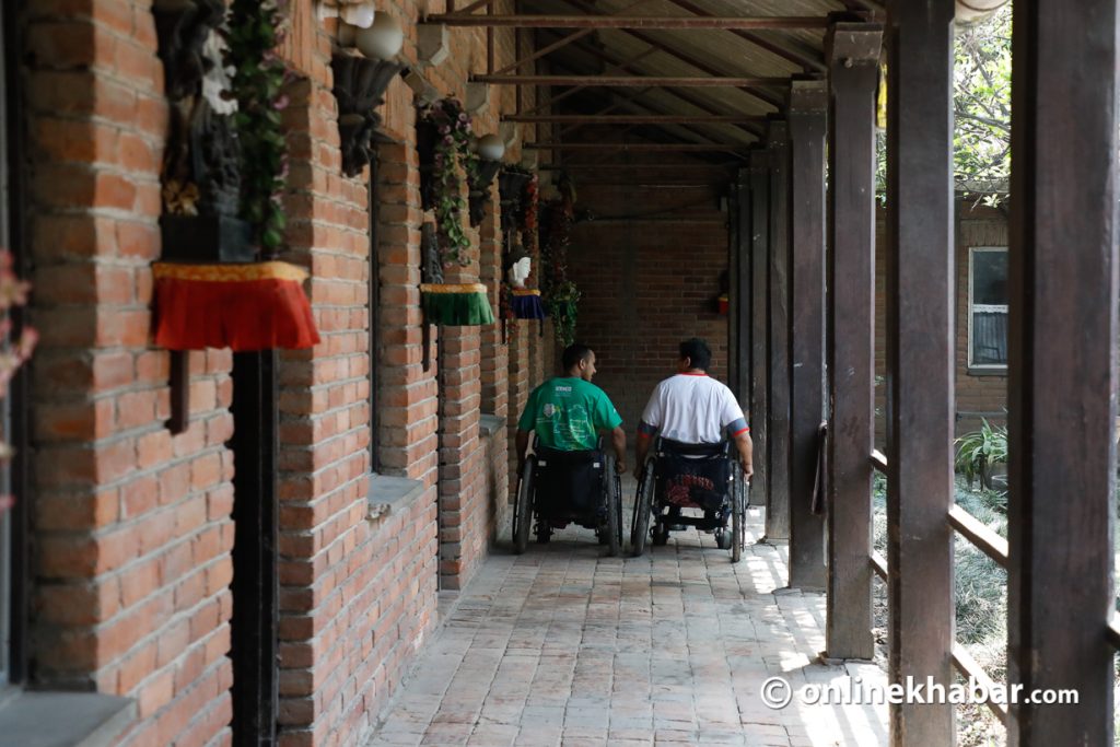 Two wheelchair-bound artists at BIA, Jorpati, the organisation that provides vocational skills to people like them regional networking for the rights of the disabled