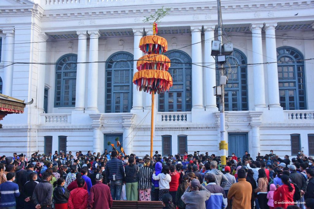 Devotees erect the Chir, a wooden pillar, to mark the start of the Holi festival, in Kathmandu, on Thursday, March 10, 2022. Photo: Chandra Bahadur Ale
