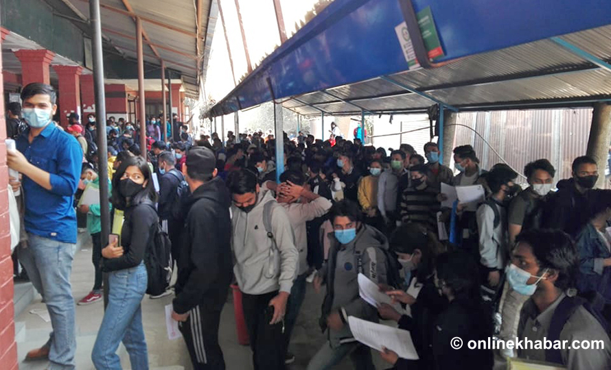 File: Students line up to obtain no-objection certificates (NOCs) to go abroad for education.