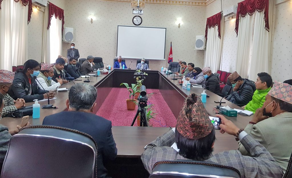 Small parties hold a meeting with the Election Commission to demand the law on election symbols for local elections be repealed, in Kathmandu, in March 2022. 